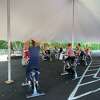 Joyride is partnering with The Corbin District to offer outdoor cycling classes under a tent in Darien.
