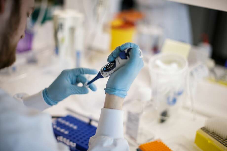 TOPSHOT - A researcher works on a vaccine against the new coronavirus COVID-19 at the Copenhagen's University research lab in Copenhagen, Denmark, on March 23, 2020.  (Photo by Thibault Savary / AFP) (Photo by THIBAULT SAVARY/AFP via Getty Images) Photo: THIBAULT SAVARY/AFP Via Getty Images