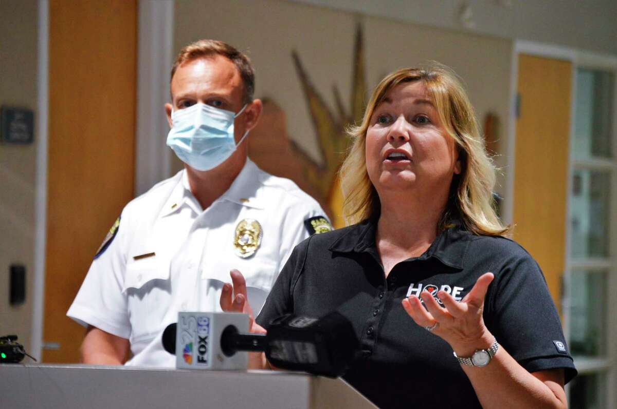 Regional coordinator for Families Against Narcotics, Lori Ziolkowski, talks about the launch of the Comeback Quick Response Team program in the cities of Midland and Saginaw, at a press conference on Monday, July 27, at the Law Enforcement Center in Midland. (Ashley Schafer/Ashley.schafer@hearstnp.com)