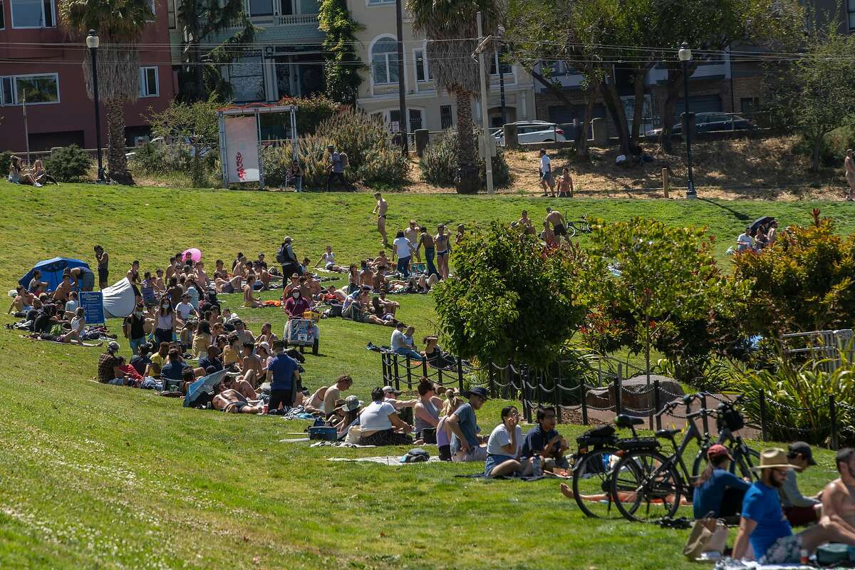 People at Dolores Park on Saturday, July 4, 2020, in San Francisco, Calif.