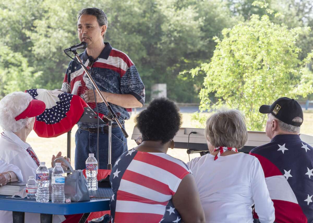 Eliel Rosa, with Nehemiah 220 Ministries, speaks at the July 4 celebration at Hogan Pak Pavilion. The event included a concert of patriotic songs by the Midland Community Band and reading the Declaration of Independence. Rosa’s ministry aims to use God’s guidance to “rebuild the founding legacies, rights and memorials of America,” according to its website.
