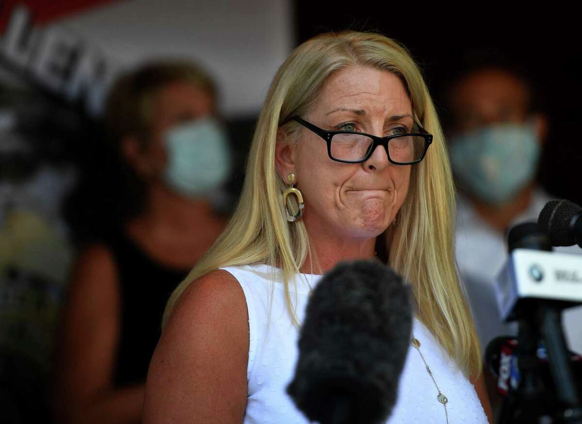 Fairfield First Selectwoman Brenda Kupchick reacts as Black Lives Matter protesters disrupt the press conference in opposition to police bill HB-6004 outside Fairfield Police Headquarters in Fairfield, Conn. on Monday, Julty 27, 2020.