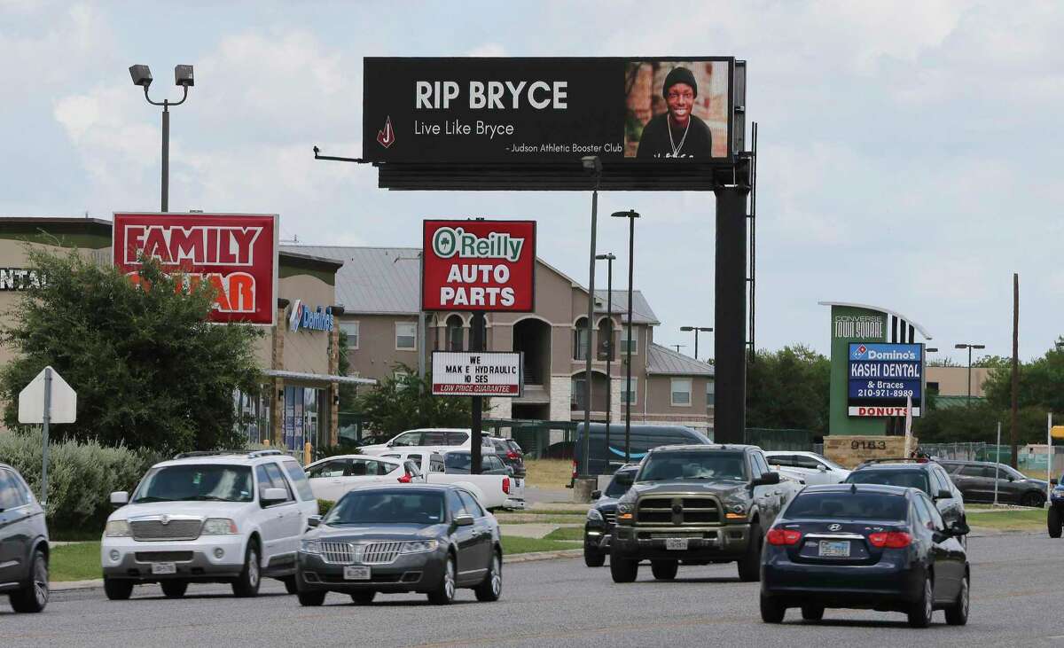 An electronic billboard honoring Bryce Wisdom flashes the sad news that Bryce has died. His family and friends rallied around the young man with the internet hashtag #BryceStrong through his battle with the disease. Wisdom's fight with cancer caught the attention of many around the country and resonated with professional athletes who responded on social media. Wisdom and his family had planned to go visit Seattle and San Diego shortly before his death.