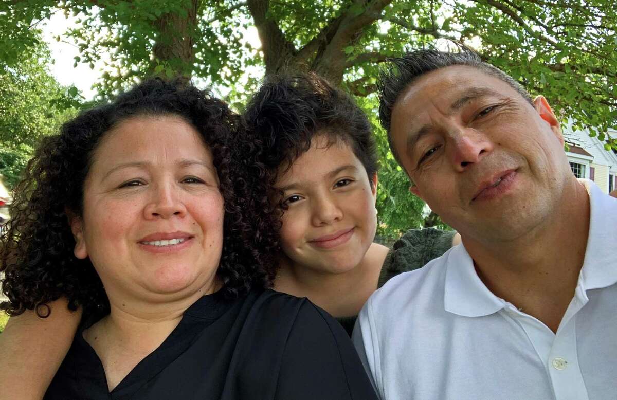 The Velásquez family of Stamford, from left, Mónica, Amilcar and Adelaida were among the recipients of the special Help-a-Neighbor campaign created to assist area residents struggling economically during the pandemic.