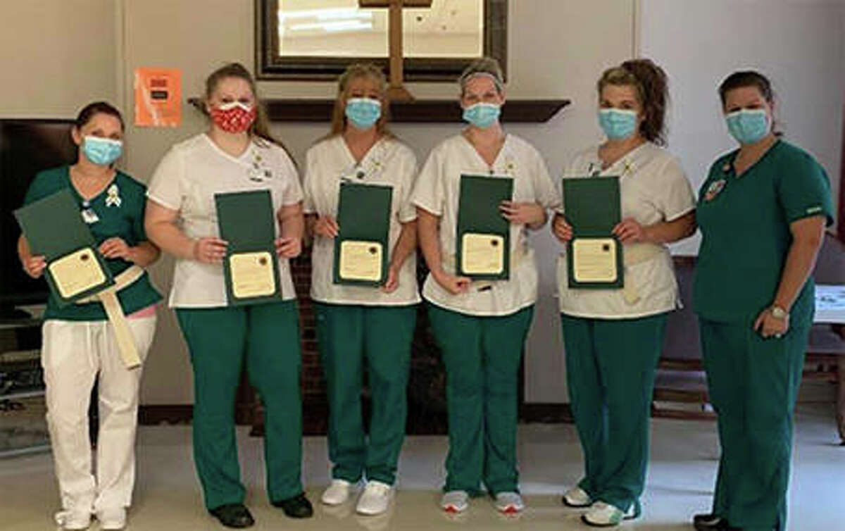 Five John Wood Community College students received their pins during a ceremony at the Barry Community Care Center: Kelsey Sherfy (from left), Jenna Kelley, Lesa Holder, Makayla Perry, Shelby Hulett and instructor Laura Mathews.