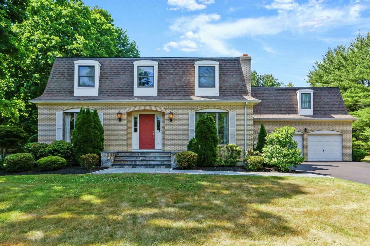 The yellow brick colonial house at 6 Ridgeway Road in Easton has a distinguished mansard wood shingle roof. Should the next owners not have a green thumb there are local farms close by, the most immediately accessible being Sherwood Farm and Silverman's Farm to purchase locally grown, fresh-picked produce. Between the two is the Easton Village Store. Also nearby is Morehouse Egg Farm in neighboring Fairfield. Recreational opportunities are provided not only by the backyard, and the finished lower level where there is a game room. Nearby is the the Easton Community Center, Easton Dog Park, Upper Vets Field, preserved open spaces with hiking trails in Easton and Fairfield, and H. Smith Richardson Golf Course in Fairfield.