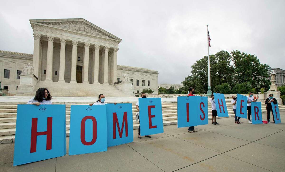 FILE - In this June 18, 2020, file photo, Deferred Action for Childhood Arrivals (DACA) students gather in front of the Supreme Court in Washington. (AP Photo/Manuel Balce Ceneta, File)