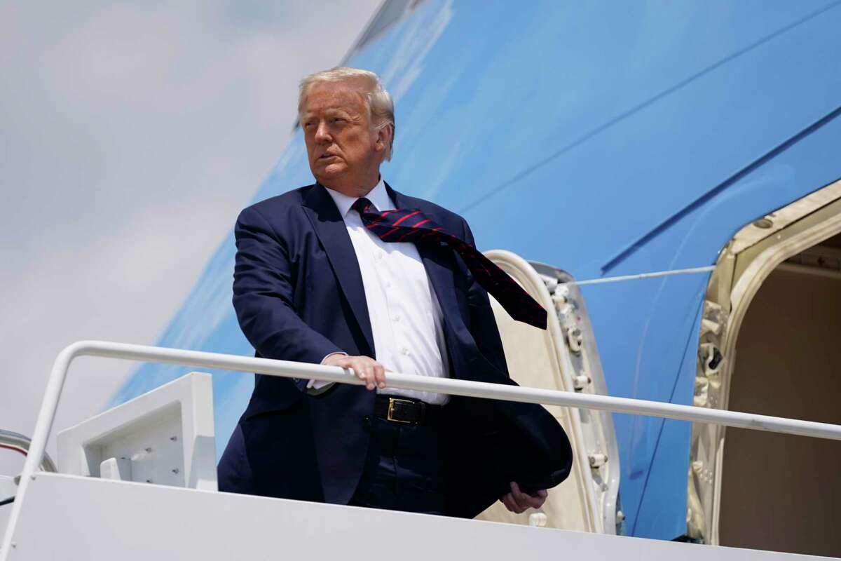 President Donald Trump boards Air Force One for a trip to visit Bioprocess Innovation Center at Fujifilm Diosynth Biotechnologies in Morrisville, N.C., on Monday, July 27, 2020. He scheduled to make a trip on Wednesday to Midland, Texas, July 29, 2020.