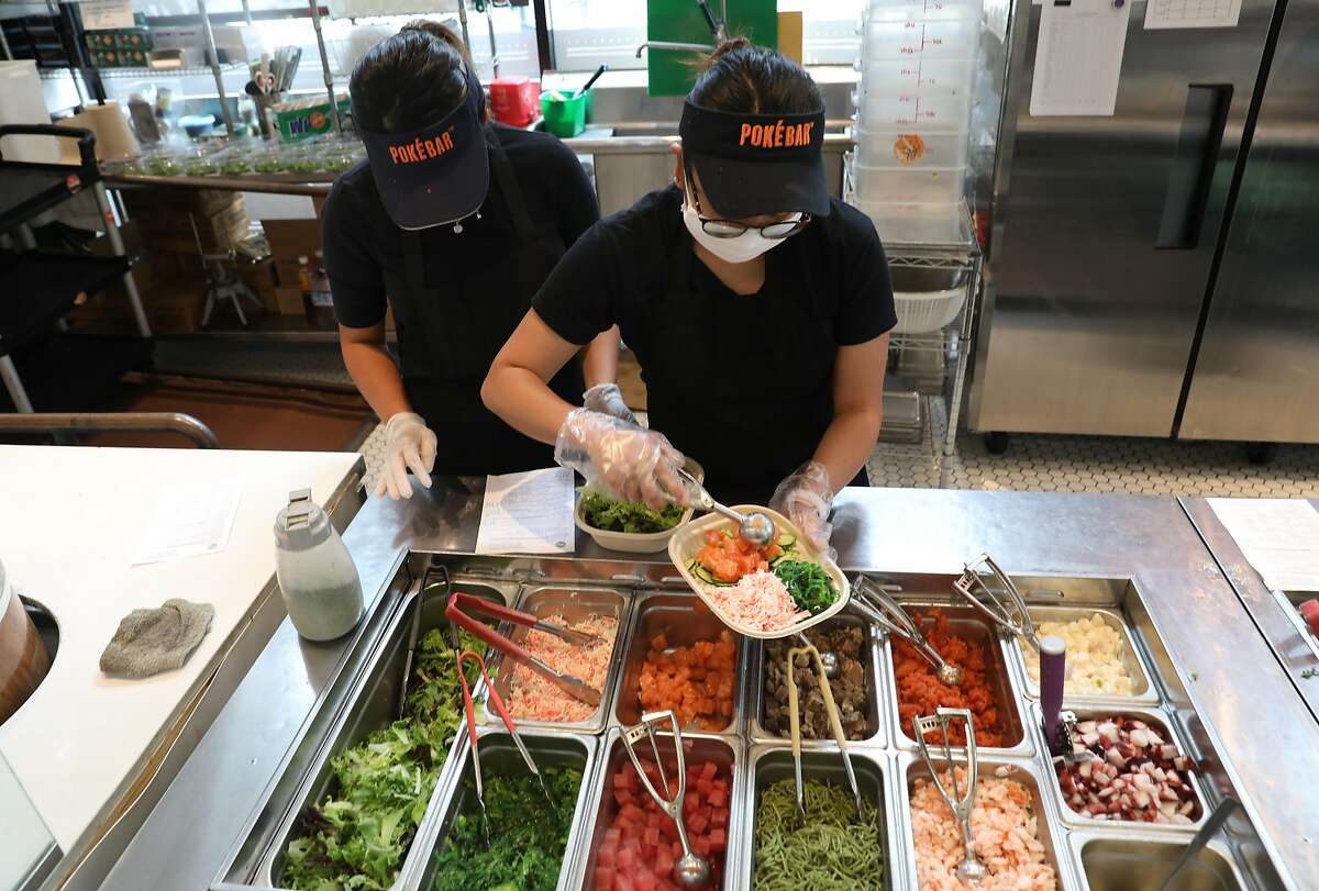 Food being served at the Poke Bar at The Market during lunch time on Tuesday, July 28, 2020, in San Francisco, Calif.