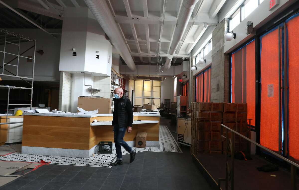 Owner Chris Foley walks through the upcoming food hall where eight food concepts including Mensho seen on Tuesday, July 28, 2020, in San Francisco, Calif.