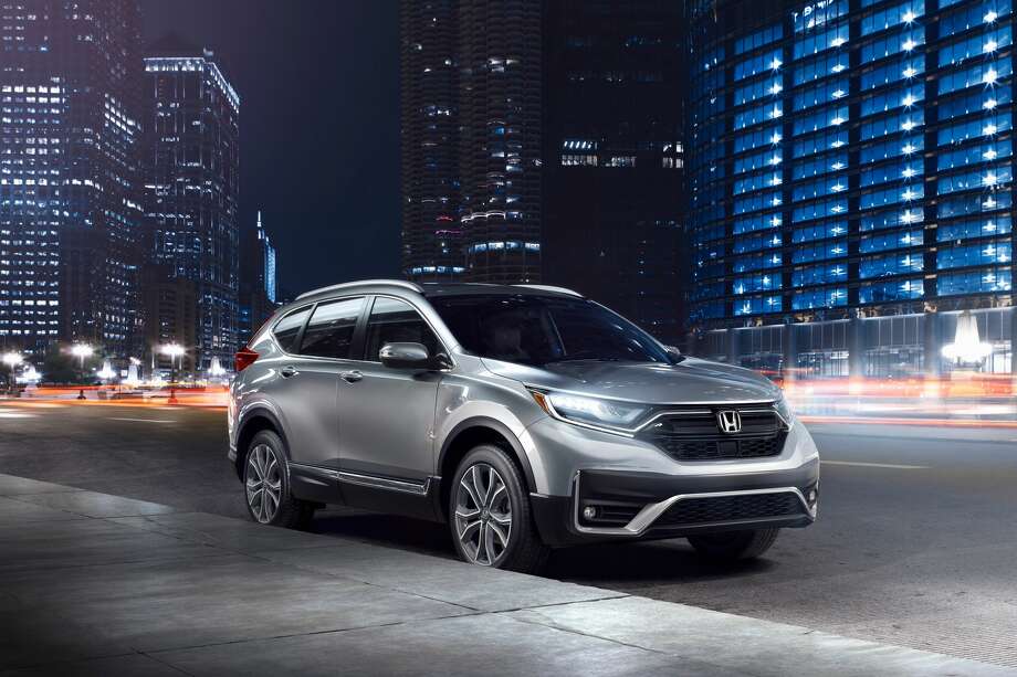 In front, broad openings for the fog lights are fully integrated into the bumper, giving the 2020 CR-V a more aggressive look, while the chrome grille is more pronounced. Photo: Honda / © 2019 Honda North America