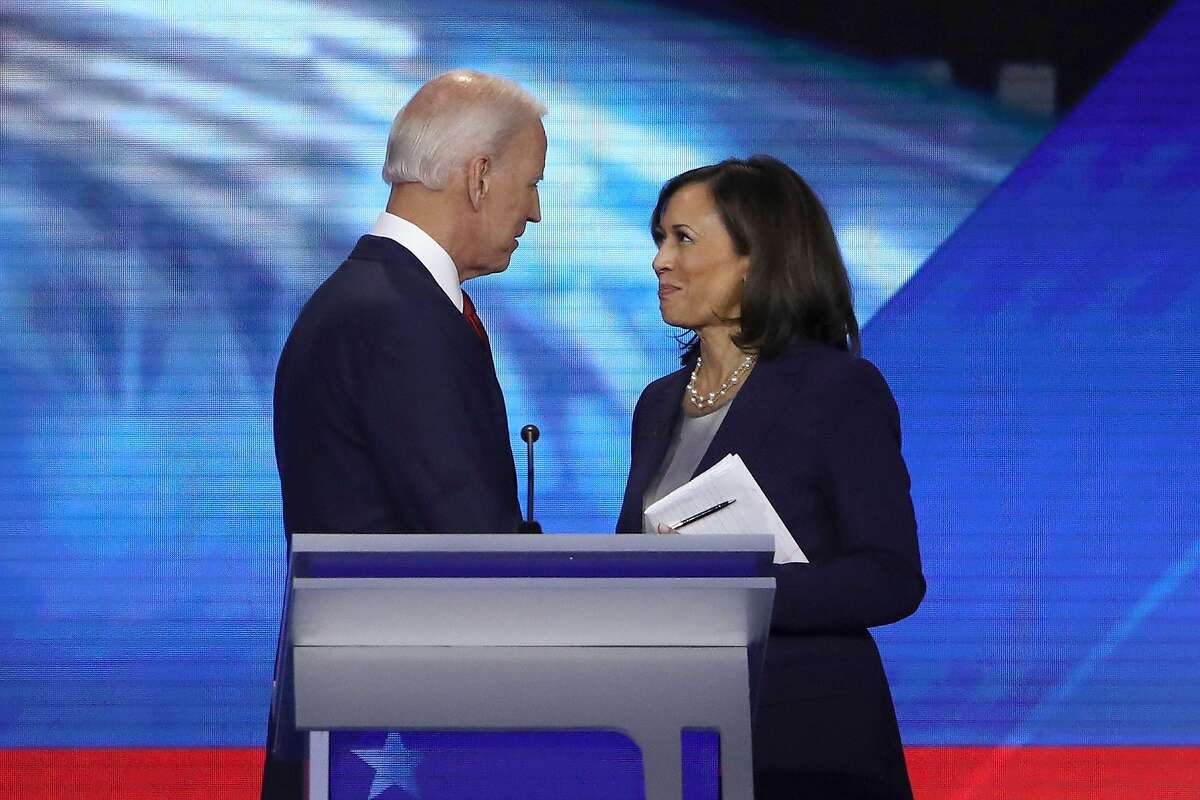 Democratic presidential candidates former Vice President Joe Biden and Sen. Kamala Harris (D-CA) speak after the Democratic Presidential Debate at Texas Southern University's Health and PE Center on Sept. 12, 2019 in Houston, Texas. (Win McNamee/Getty Images/TNS)