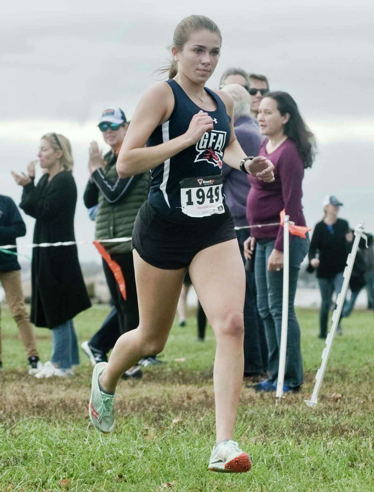 Caroline McCall, of Greens Farms Academy, finishing third in the FAA Girls Cross Country Championships at Sherwood Island in Westport. Monday, Oct. 28, 2019