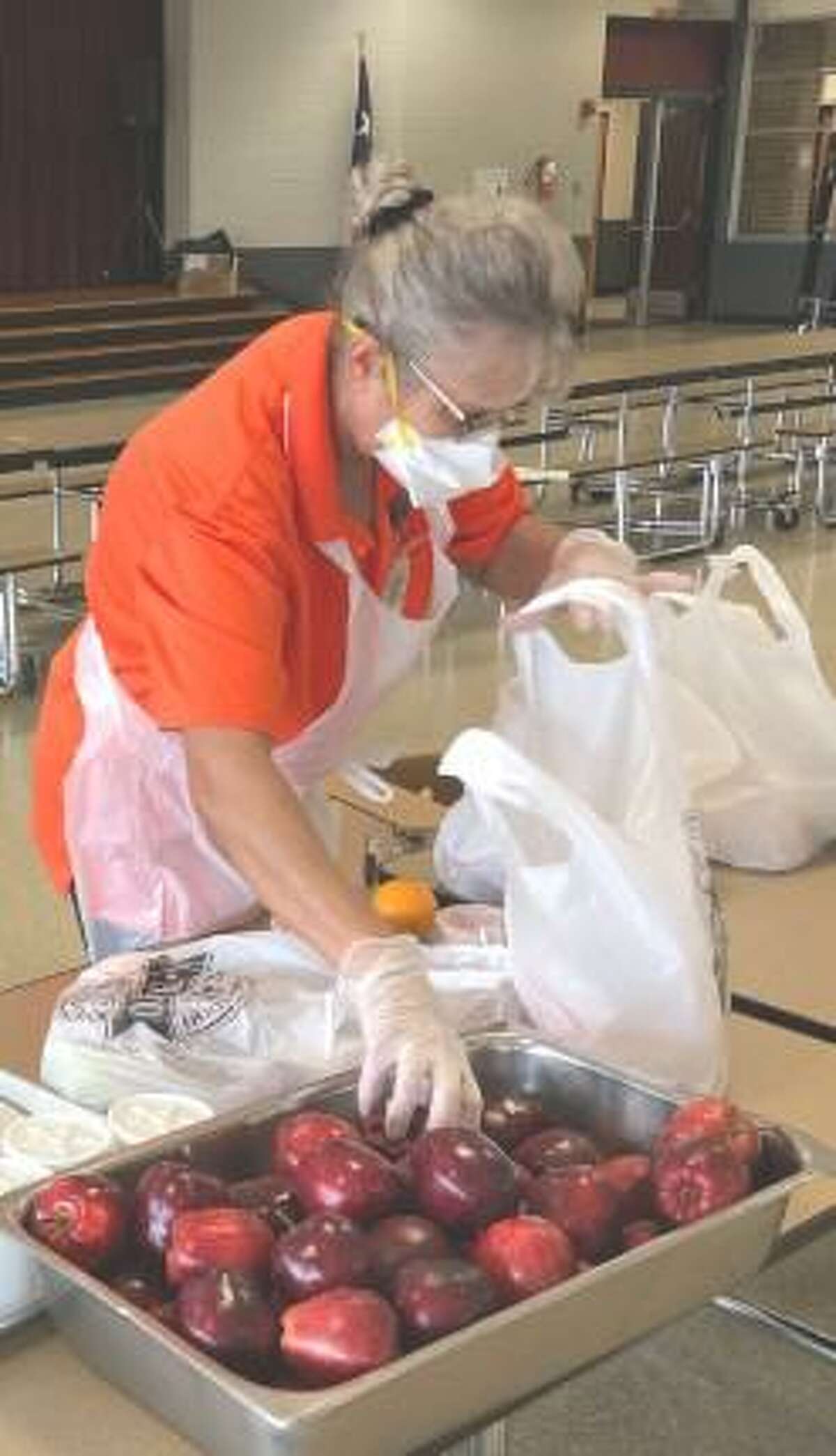 The Magnolia ISD Child Nutrition Department distributes meals to children during the COVID-19 pandemic.