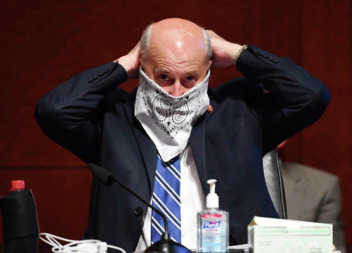 Rep. Louie Gohmert, R-Texas, adjusts his face mask during a House Judiciary Committee markup of the Justice in Policing Act of 2020 on Capitol Hill in Washington, Wednesday, June 17, 2020. (Kevin Dietsch/Pool via AP)