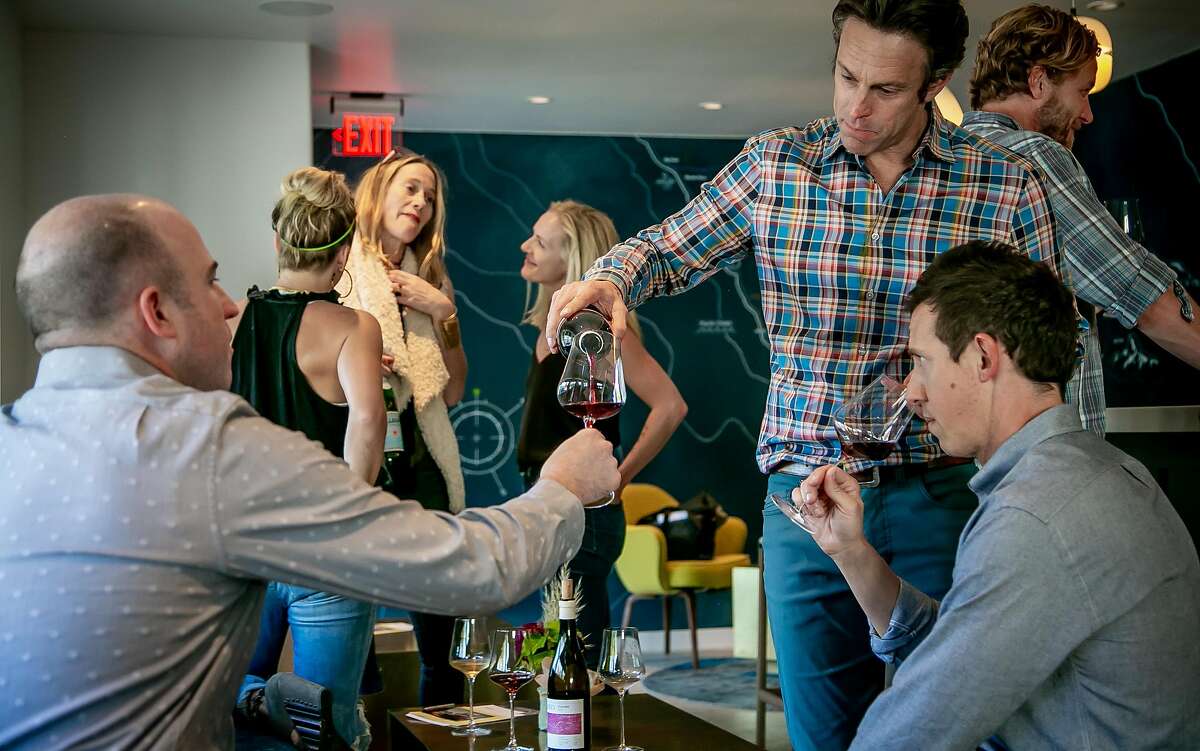 Winemaker/owner Matt Licklider pours wine for people at the Lioco Winery tasting room in Healdsburg, Calif. on September 6th, 2018.