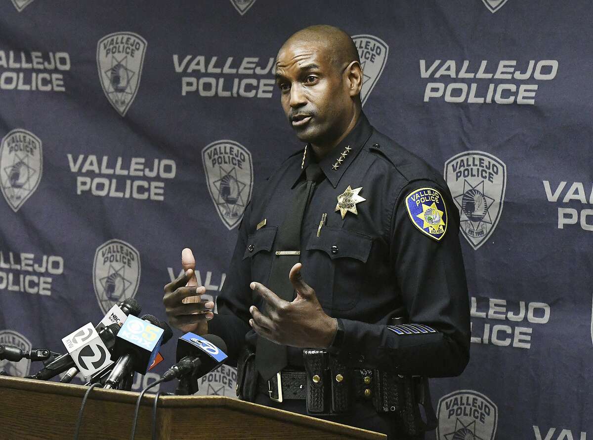 Vallejo Police Chief Shawny Williams talks during a news conference in Vallejo, Calif., on July 8, 2020. The police chief of a San Francisco Bay Area city under scrutiny after several fatal police shootings says he is opening an "official inquiry" into allegations that officers bent their badges to mark on-duty fatal shootings. Chief Williams told the San Francisco Chronicle Wednesday, July 29, 2020, that badge bending would amount to misconduct and that a fact-finding mission may lead to an independent investigation. (Chris Riley/The Times-Herald via AP)