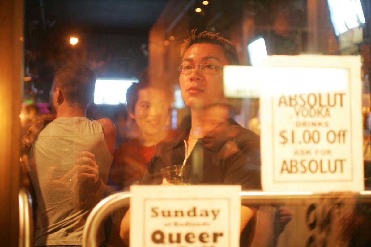 sfpride25029_mk.jpg Ben Stuart watches as protesters parade outside SFBadlands on Saturday night. Stuart said he has trouble believing the accusation against the bar's owner because he hangs out there all the time with from of all races and hasn't witnessed any discrimination. A civil rights group called And Castro for All has started a boycott and conducts weekly Saturday night protest of SF Badlands, a bar in the Castro. The group claims bar owner Les Natali is a racist and back up their assertions with a report from the SF Human Rights Commission that found Natali discriminated against some people of color who tried to enter his bar 6/17/05 Mike Kepka / The Chronicle