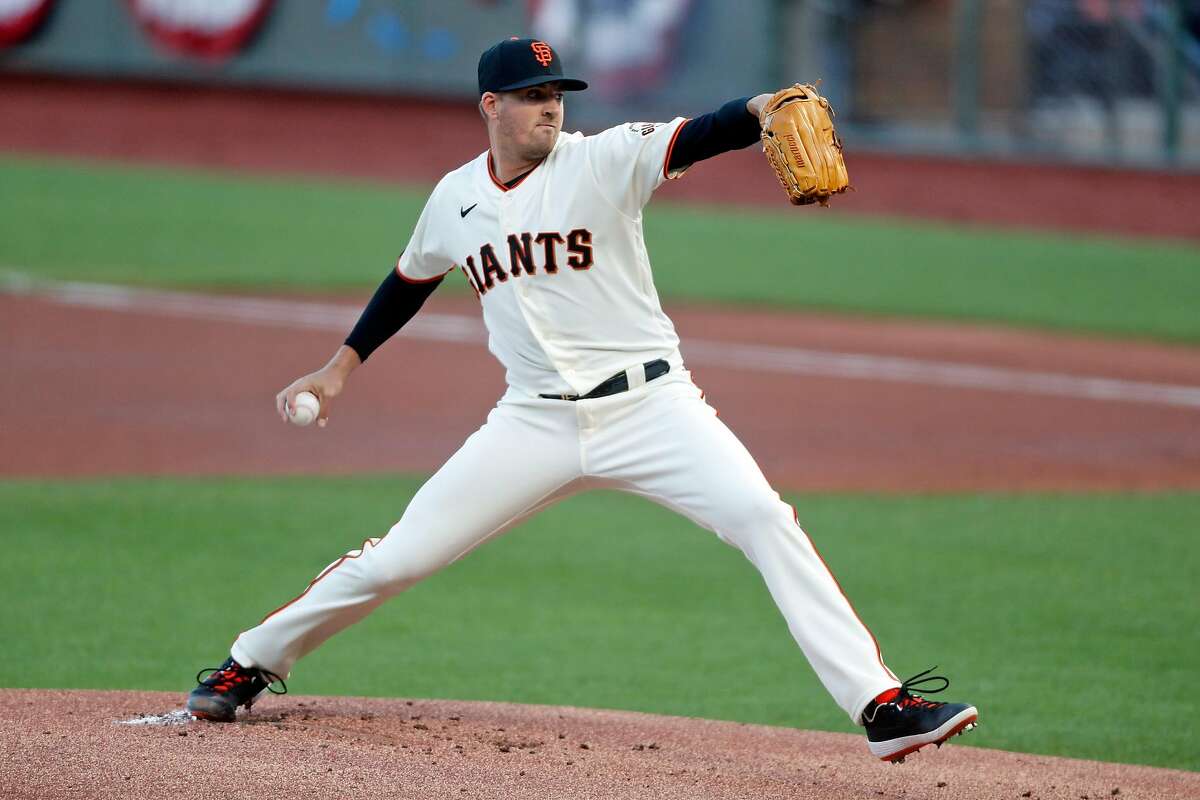San Francisco Giants' starting pitcher Kevin Gausman delivers in 1st inning against San Diego Padres during MLB game at Oracle Park in San Francisco, Calif., on Thursday, July 30, 2020.