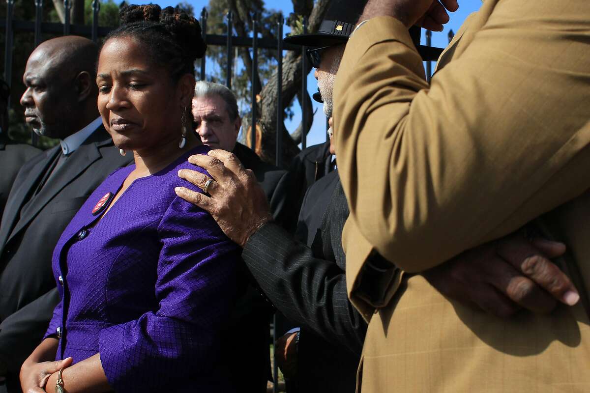 Lynette Gibson McElhaney with clergy and others at a rally to endorse her run for City Council in 2012.