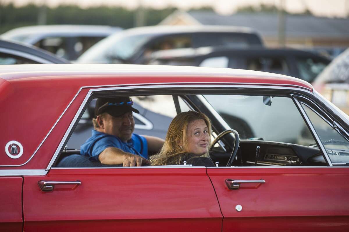 Families arrive to watch a drive-in showing of "The Princess Bride" as part of the Midland Area Community Foundation's Riverdays festival Friday, July 31, 2020 at Midland County Fairgrounds. (Katy Kildee/kkildee@mdn.net)