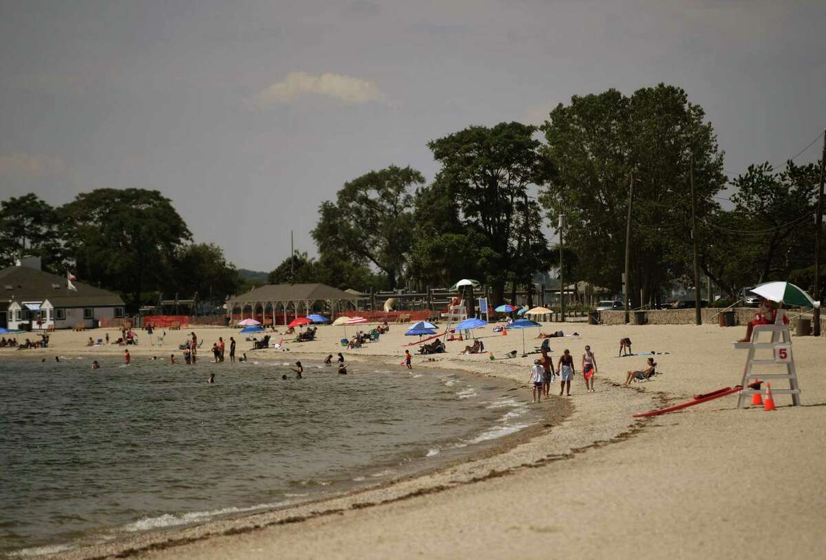 Beachgoers beat the heat at Compo Beach in Norwalk, Conn. on Monday, July 20, 2020.