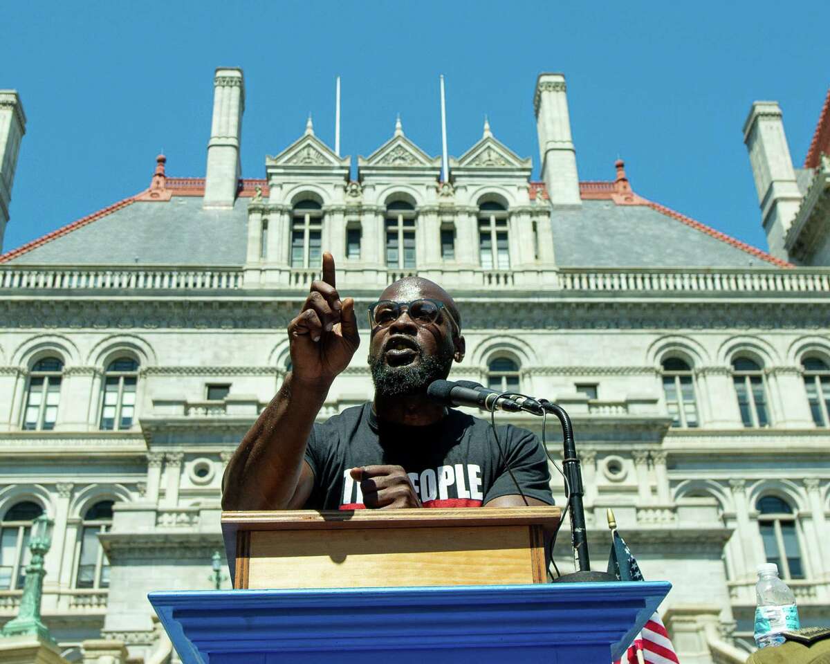 A speech by Manetertep El Day, founder of the Albany House of Peace, calmed attendees of a rally to support police and Black Lives Matter protesters who had just moments encountered each other outside the New York State Capitol building in Albany, NY, on Saturday, Aug. 1, 2020 (Jim Franco/Special to the Times Union.)