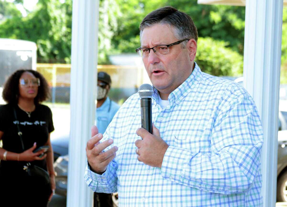 State Attorney Joseph Corradino speaks during a Stop the Violence rally held in the parking lot of Baker-Isaac Funeral Home in Bridgeport, Conn., on Saturday August 1, 2020.