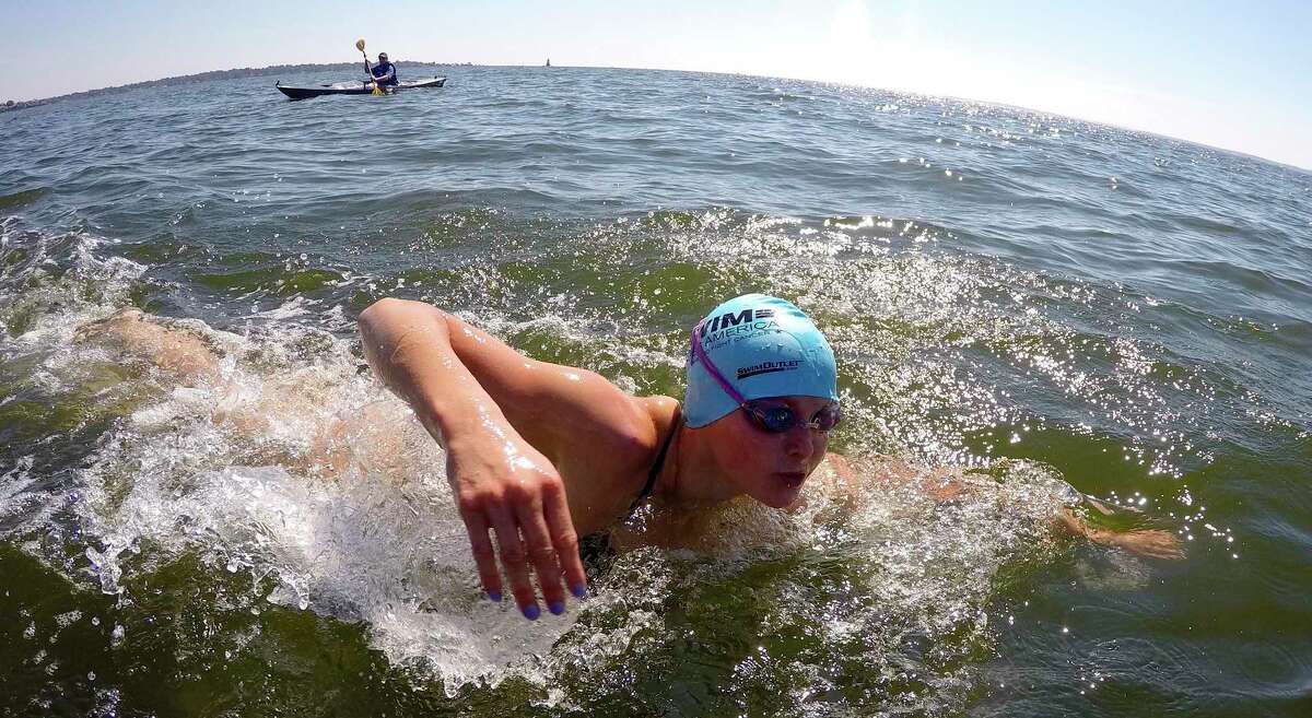 Meghan Lynch participates in the "Buoy-to-Buoy" swim at Rocky Point Club in Old Greenwich, Connecticut on August 1, 2020. The Swim Across America Event organized by Team Julian, honoring the legacy of Greenwich's own Julian Fraser, who lost his life battling a rare form of cancer, raised over $45,000 for cancer research. Over 50 swimmers from Rocky Point Club and Greenwich High School's Swim and Water Pola teams participated in the 1-mile swim in the Long Island Sound. Several volunteers in kayaks and on paddle boards, Including Julian mother, Cristy Fraser, kept watch over the group during the benefit swim.
