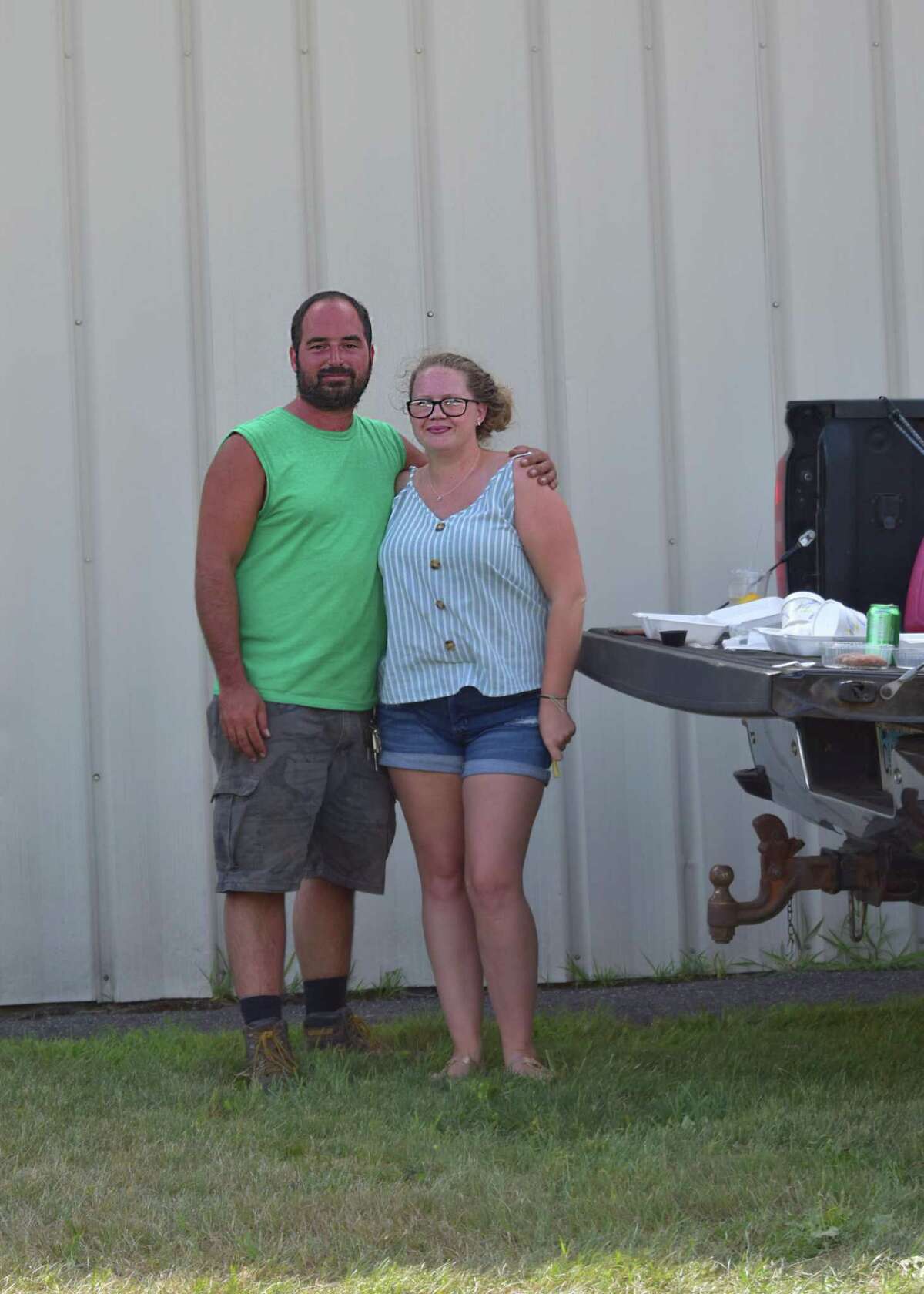 Eric Vogt and Britney Correll of Burlington enjoyed Low N Slow Mac N Cheese while tailgating Aug. 1 at the Food Truck Drive-Thru Festival at the Goshen Fairgrounds.