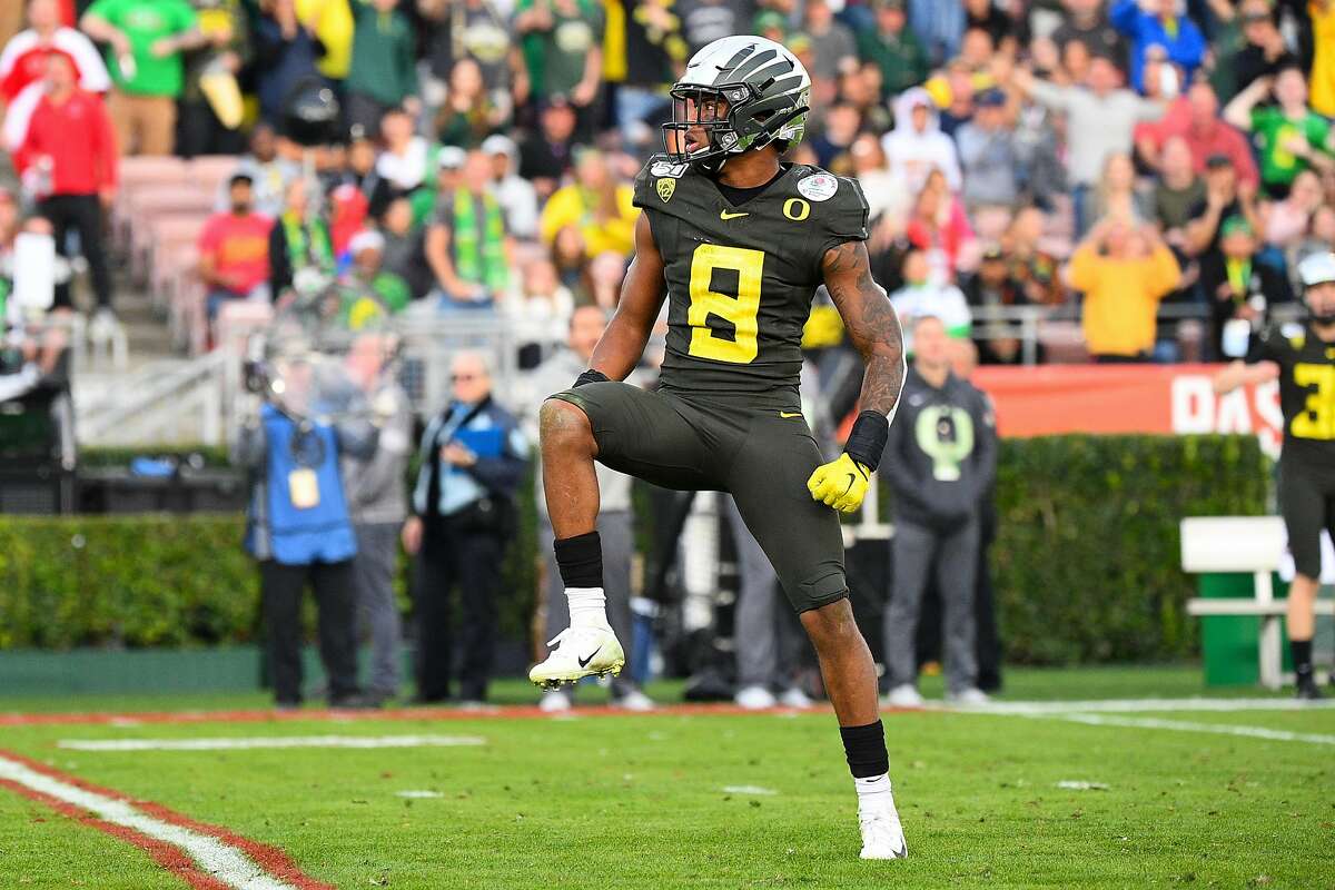 Oregon Ducks (8) Jevon Holland (S) celebrates during the Rose Bowl game between the Wisconsin Badgers and the Oregon Ducks on January 1, 2020 at the Rose Bowl in Pasadena, CA. (Photo by Brian Rothmuller/Icon Sportswire via Getty Images)