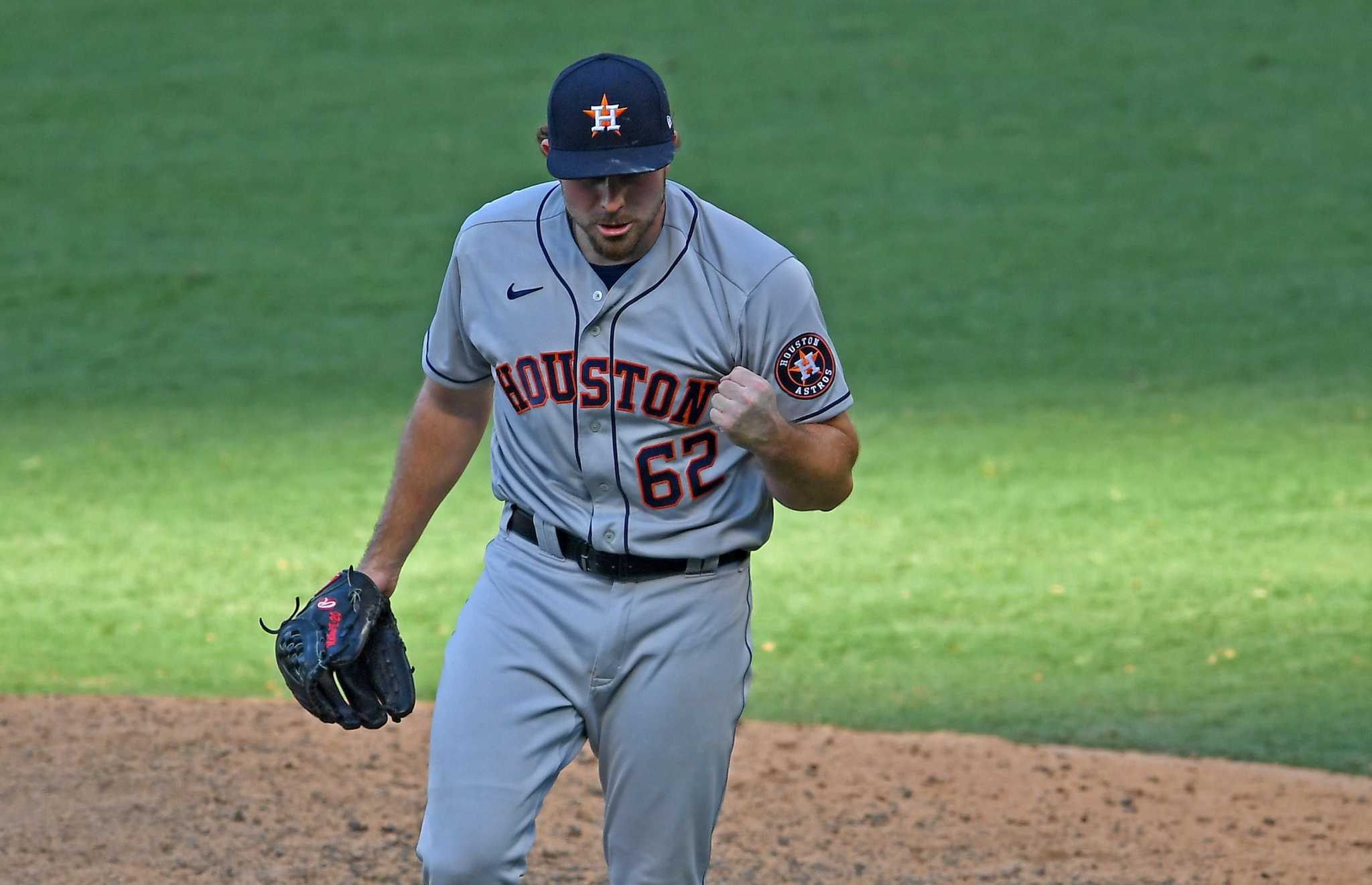 Andre Scrubb of the Houston Astros pitches in the ninth inning News  Photo - Getty Images