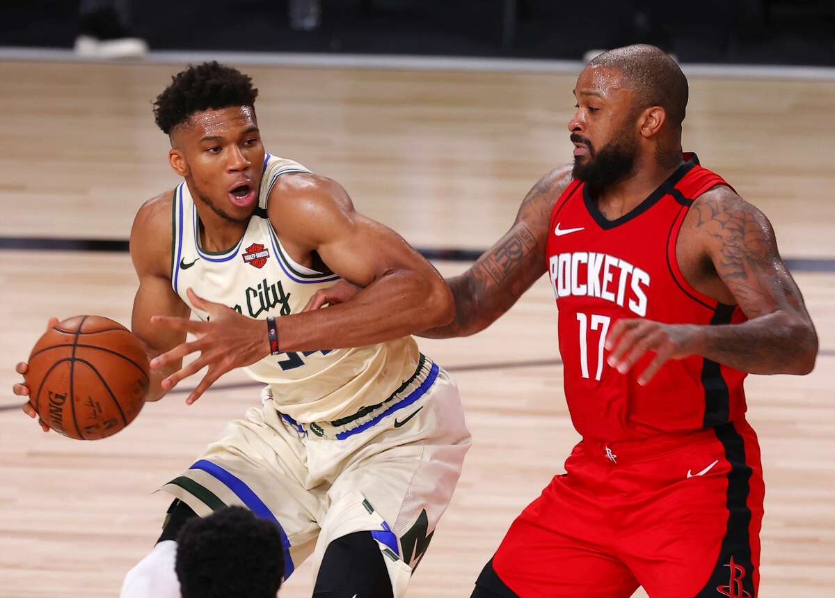 While the Bucks' Giannis Antetokounmpo (left) topped the NBA All-Defensive team voting, the Rockets' P.J. Tucker got 29 second-team votes.