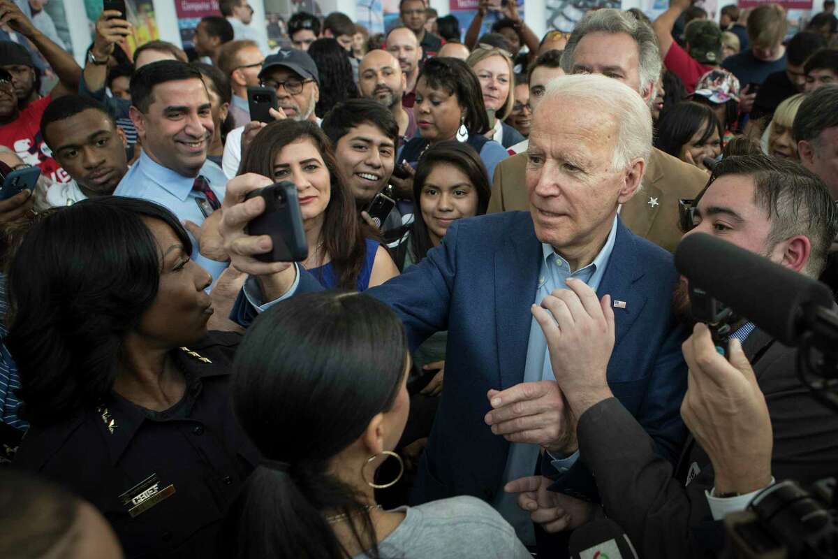 Democratic presidential hopeful former Vice President Joe Biden takes photos with supporters following his speech during a campaign stop on Monday, March 2, 2020 at Texas Southern University in Houston.