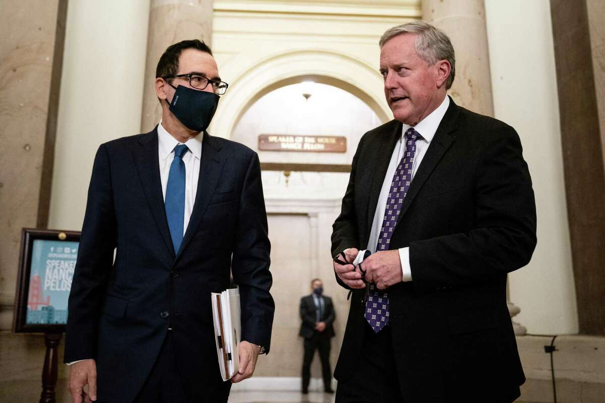Treasury Secretary Steve Mnuchin, left, and White House Chief of Staff Mark Meadows speak with reporters last month about the latest round of stimulus. A final deal needs to include assistance for cities and counties, which provide crucial basic services and are stretched to the breaking point.