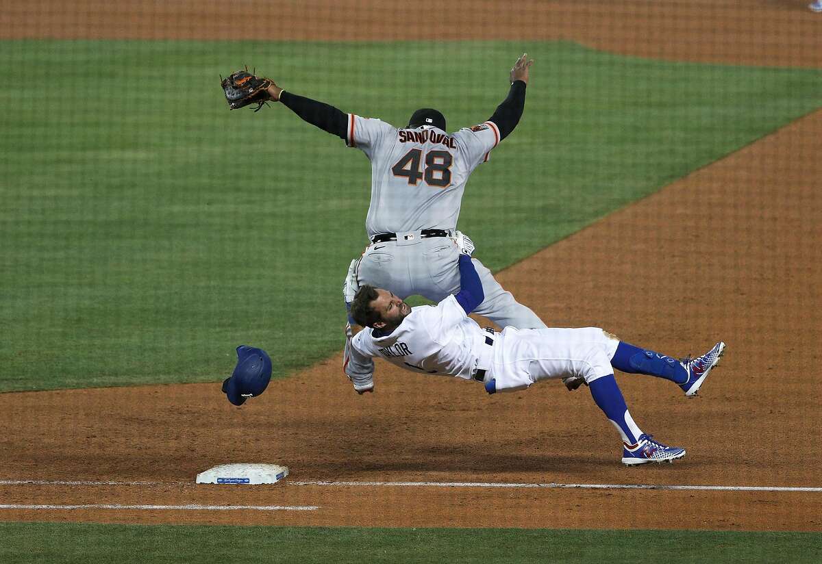 San Francisco Giants Evan Longoria makes a catch during practice