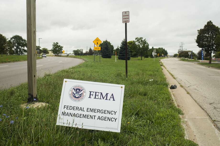 Officials with FEMA staff a documentation drop-off center Tuesday, Aug. 4, 2020 at Dow Diamond for those impacted by the May flooding to submit any required supporting documents for their disaster assistance applications. (Katy Kildee/kkildee@mdn.net) Photo: (Katy Kildee/kkildee@mdn.net)