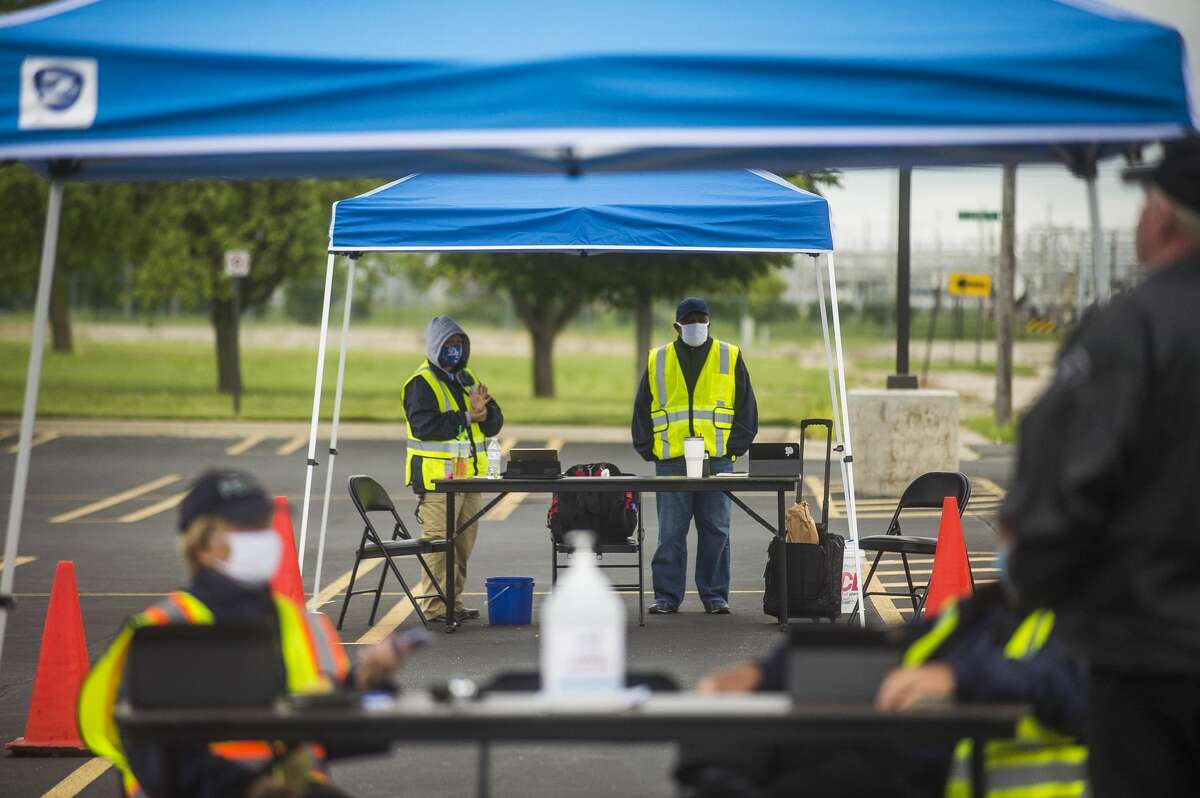 Officials with FEMA staff a documentation drop-off center Tuesday, Aug. 4, 2020 at Dow Diamond for those impacted by the May flooding to submit any required supporting documents for their disaster assistance applications. (Katy Kildee/kkildee@mdn.net)