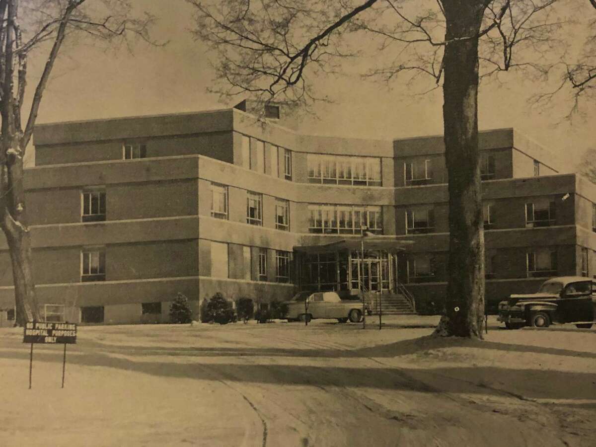 New Milford Hospital has grown since it first opened in 1921 in a two-story frame home on Whittlesey Avenue. At the time, a group of townspeople purchased the house and converted it into a 12-bed facility the first of its kind in the area. It was used for three years until a need for larger facilities resulted in the donation by Edward M. Chapman of a private home on Elm Street in front of the present day hospital. In use as a hospital for 26 years, post-war increased in population approached the capacity until the construction of a larger, modern, fireproof building became necessary. The groundbreaking ceremony for the new hospital was held June 17, 1949. On Nov. 27, 1950, patients were transferred from the Bostwick home to the then-new, three-story hospital, above. The hospital was designed in a