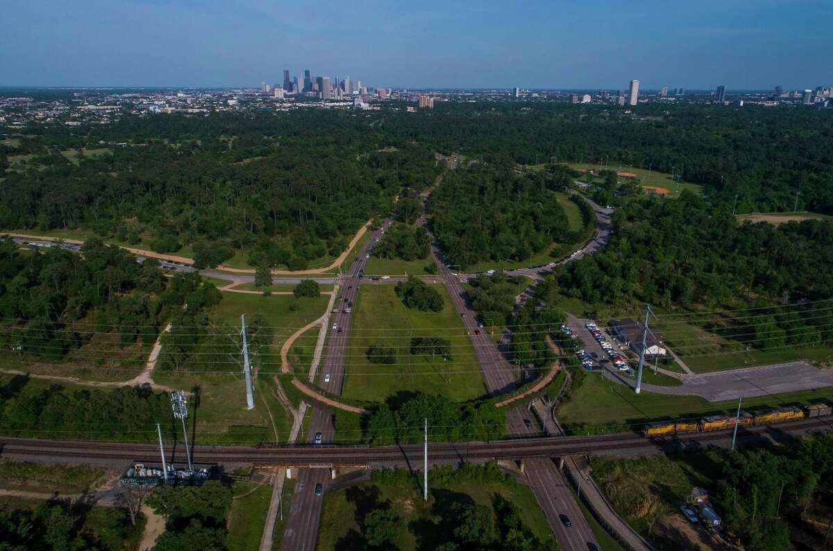 A $70 million donation by Rich and Nancy Kinder to the Memorial Park Conservancy could completely transform this portion of the park where Woodway joins Memorial Drive looking east towards downtown, photographed in 2018, by adding a new land bridge for pedestrians among other improvements. The gift to the conservancy would be the largest park donation in the city’s history.