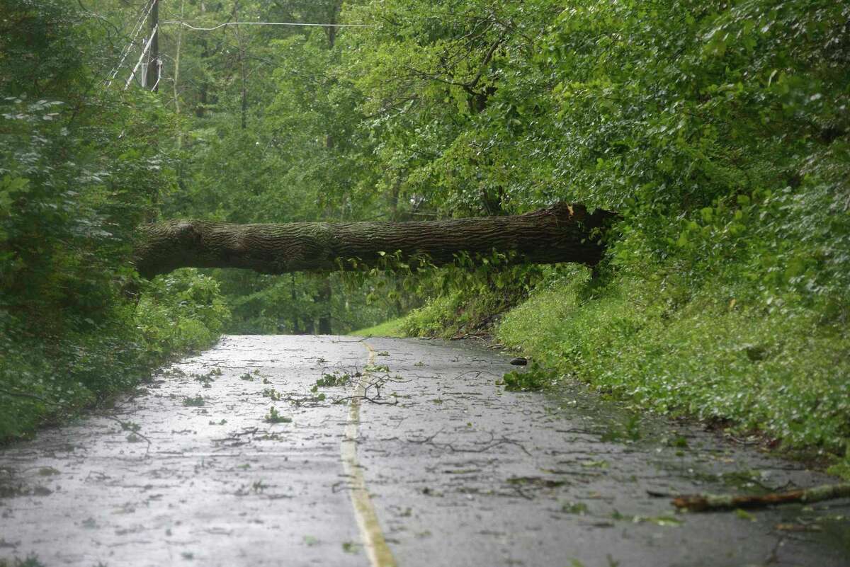 Wilton and towns throughout the state are suffering from power outages and downed trees and wires from tropical storm Isaias. Photo of road in Danbury, Conn. Tuesday, August 4, 2020.