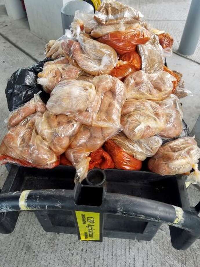 201 pounds of pork was found hidden inside the engine compartment of a 1980 F-150 at the Texas-Mexico border on Wednesday, July 29. Photo: CPB Officers