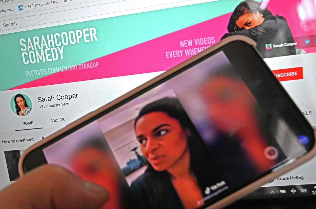 This photo illustration dated July 16, 2020 and taken in Washington, DC shows comedian Sara Cooper’s channel on a computer screen and a sketch of US author and Cooper on a mobile phone. Cooper got her start on TikTok, lip-syncing to Donald Trump’s public statements. TikTok is the target of an potential ban by the White House.