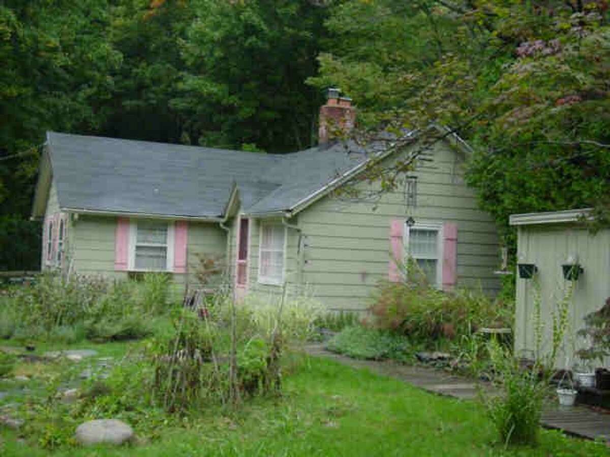 The house at 695 Danbury Road, as shown on the Wilton Assessor's database, suffered severe damage from fire on Aug. 4.