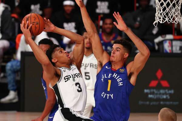 Spurs get acquainted with Michael Porter Jr. in loss to Nuggets ...