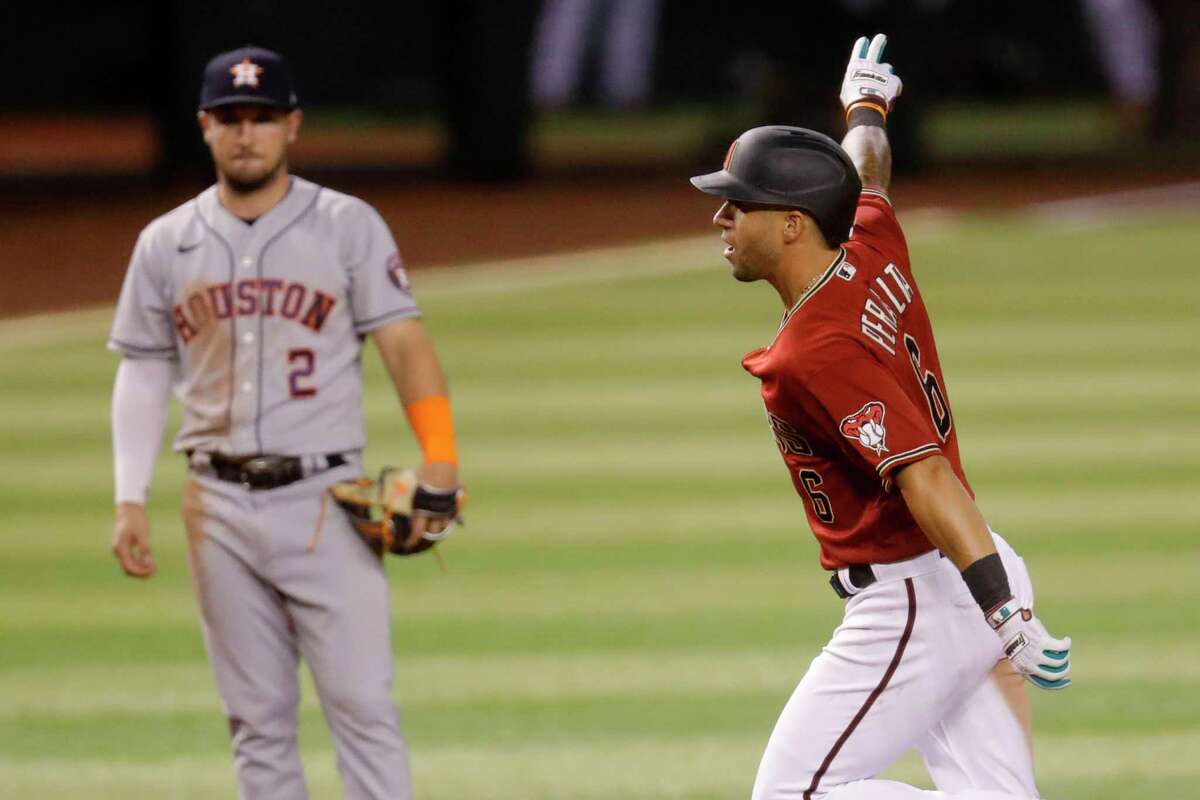 Kole Calhoun hits 2 home runs to lead Diamondbacks over Astros