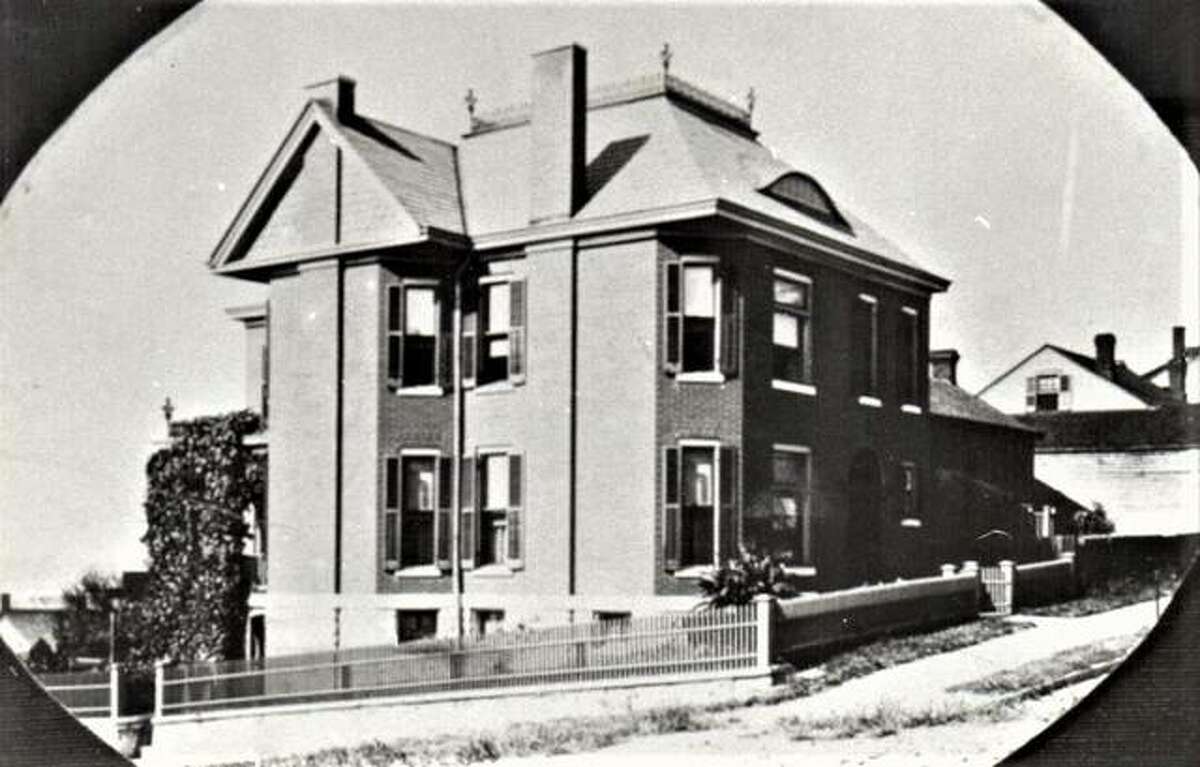 The historic Koenig House, built in 1897 by Julius Koenig and designed by noted Alton architect Lucas Pfeiffenberger, as it appeared before brick streets were installed throughout the city.