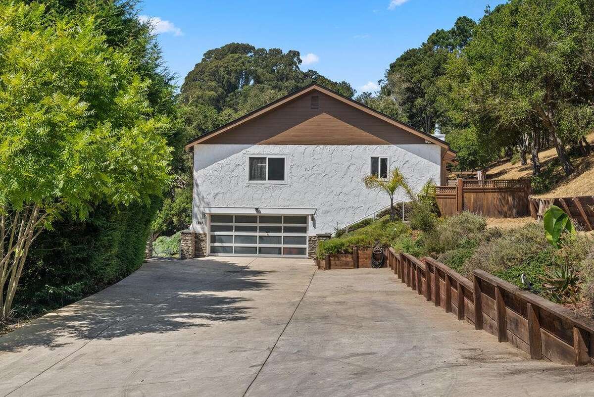 65 Dipsea Road. Stinson Beach, CA PRICE: $4,800,000 DESCRIPTION: Dip into the calm sublime of the maritime... Situated on the widest stretch of the Seadrift lagoon with beautiful views of the lagoon and Mount Tamalpais, this Dipsea darling is surrounded by natural beauty. A short walk to downtown Stinson Beach and a stunning, 40 minute drive to the Golden Gate, you can't ask for a better location for your vacation home. Brimming with natural light and water views from every room, you’ll settle quickly into the calmness and joy this darling home emanates. The spacious two bedroom, two bathroom home has much to offer, with plenty of storage for all the fun toys that come with beach life; surfboards hanging in the garage, beach cruisers ready to ride, and kayaks and standup paddleboards stowed away on the lower dock — where you can plunge right into the Seadrift lagoon. Life at the beach doesn't get any better than this. Within the Seadrift community, you are rooted in coastal comfort with easy access to the bird sanctuary on the Bolinas lagoon, the coveted Seadrift beach with great surf and beautiful views, tennis and pickleball courts, and easy access to the Tamalpais trails. This Dipsea darling is a home for making memories to be cherished forever. Specifications: ? Spacious 2 bedroom 2 full bath ? 1859 square footage house ? 7500 square footage lot ? Primary bedroom with grand en suite bathroom ? Second bedroom and second full bathroom separated by the main living space ? Den area ? Kitchen island and open concept living area with fireplace ? Dining room ? Wraparound back deck and lower dock ? Hot tub ? Lower storage...