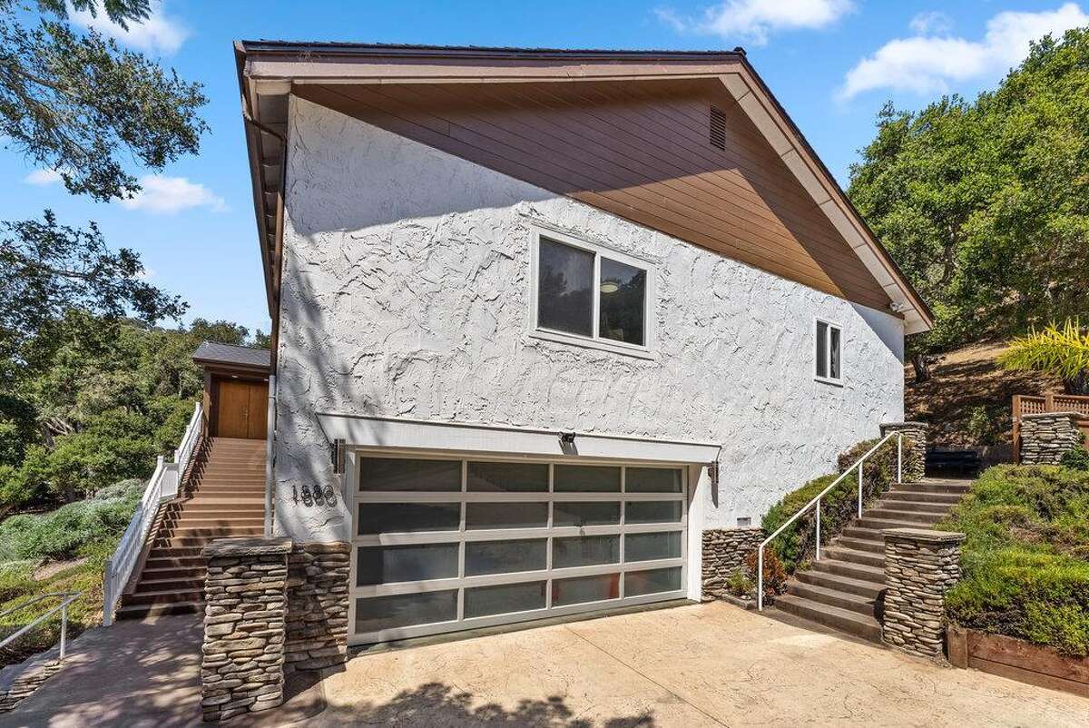 65 Dipsea Road. Stinson Beach, CA PRICE: $4,800,000 DESCRIPTION: Dip into the calm sublime of the maritime... Situated on the widest stretch of the Seadrift lagoon with beautiful views of the lagoon and Mount Tamalpais, this Dipsea darling is surrounded by natural beauty. A short walk to downtown Stinson Beach and a stunning, 40 minute drive to the Golden Gate, you can't ask for a better location for your vacation home. Brimming with natural light and water views from every room, you’ll settle quickly into the calmness and joy this darling home emanates. The spacious two bedroom, two bathroom home has much to offer, with plenty of storage for all the fun toys that come with beach life; surfboards hanging in the garage, beach cruisers ready to ride, and kayaks and standup paddleboards stowed away on the lower dock — where you can plunge right into the Seadrift lagoon. Life at the beach doesn't get any better than this. Within the Seadrift community, you are rooted in coastal comfort with easy access to the bird sanctuary on the Bolinas lagoon, the coveted Seadrift beach with great surf and beautiful views, tennis and pickleball courts, and easy access to the Tamalpais trails. This Dipsea darling is a home for making memories to be cherished forever. Specifications: ? Spacious 2 bedroom 2 full bath ? 1859 square footage house ? 7500 square footage lot ? Primary bedroom with grand en suite bathroom ? Second bedroom and second full bathroom separated by the main living space ? Den area ? Kitchen island and open concept living area with fireplace ? Dining room ? Wraparound back deck and lower dock ? Hot tub ? Lower storage...