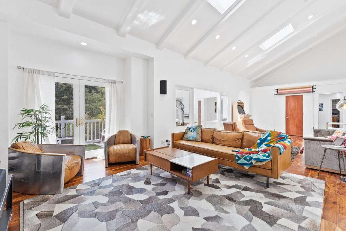 65 Dipsea Road. Stinson Beach, CA PRICE: $4,800,000 DESCRIPTION: Dip into the calm sublime of the maritime... Situated on the widest stretch of the Seadrift lagoon with beautiful views of the lagoon and Mount Tamalpais, this Dipsea darling is surrounded by natural beauty. A short walk to downtown Stinson Beach and a stunning, 40 minute drive to the Golden Gate, you can't ask for a better location for your vacation home. Brimming with natural light and water views from every room, you’ll settle quickly into the calmness and joy this darling home emanates. The spacious two bedroom, two bathroom home has much to offer, with plenty of storage for all the fun toys that come with beach life; surfboards hanging in the garage, beach cruisers ready to ride, and kayaks and standup paddleboards stowed away on the lower dock — where you can plunge right into the Seadrift lagoon. Life at the beach doesn't get any better than this. Within the Seadrift community, you are rooted in coastal comfort with easy access to the bird sanctuary on the Bolinas lagoon, the coveted Seadrift beach with great surf and beautiful views, tennis and pickleball courts, and easy access to the Tamalpais trails. This Dipsea darling is a home for making memories to be cherished forever. Specifications: ? Spacious 2 bedroom 2 full bath ? 1859 square footage house ? 7500 square footage lot ? Primary bedroom with grand en suite bathroom ? Second bedroom and second full bathroom separated by the main living space ? Den area ? Kitchen island and open concept living area with fireplace ? Dining room ? Wraparound back deck and lower dock ? Hot tub ? Lower storage...